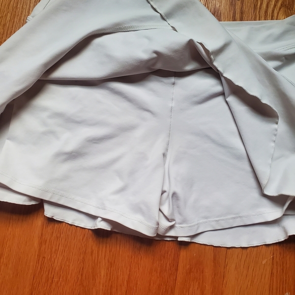 Bundle 2 Tennis Skirts- Bebe White and Blue And White Belenberdel Size M - Picture 10 of 11